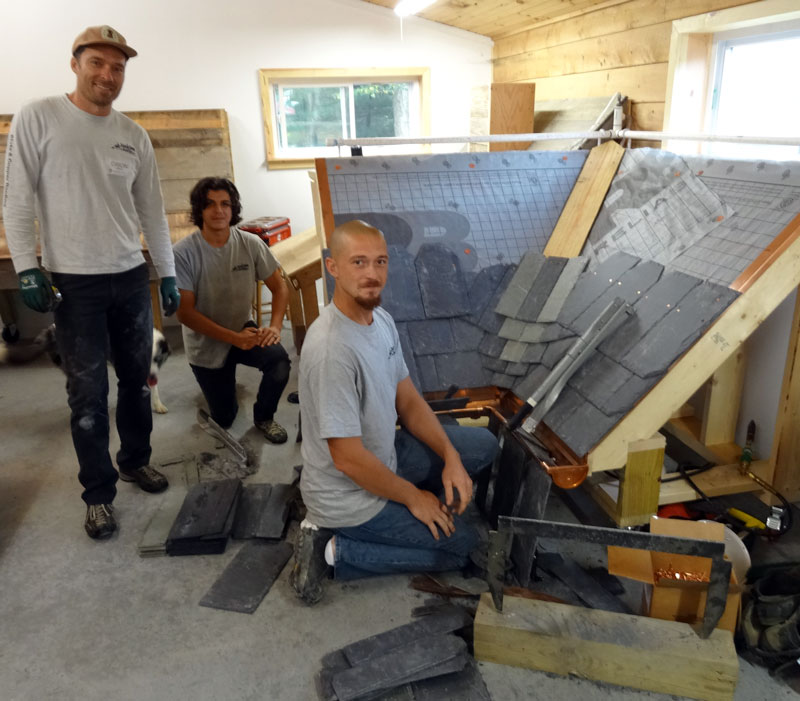 Laced slate valley installation is taught at the Slate Roofing Contractors Association conference.