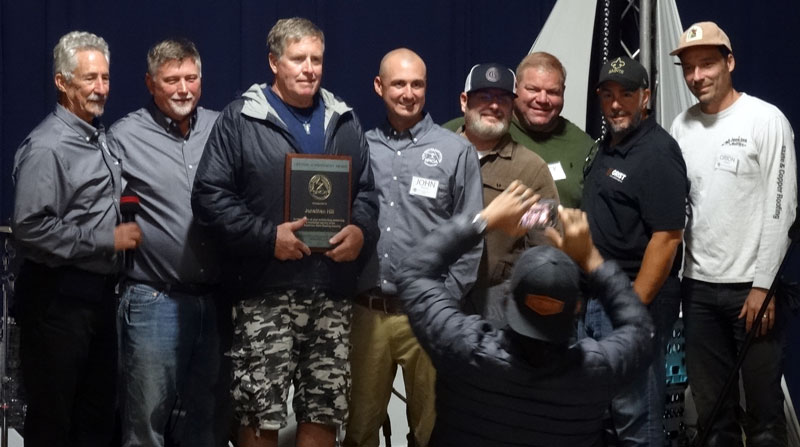 Jon Hill of Greenstone Slate is presented with the Lifetime Achie3vement Award at the Slate Roofing Contractors Association 20th Anniversary Conference, September, 2025, Grove City, PA.
