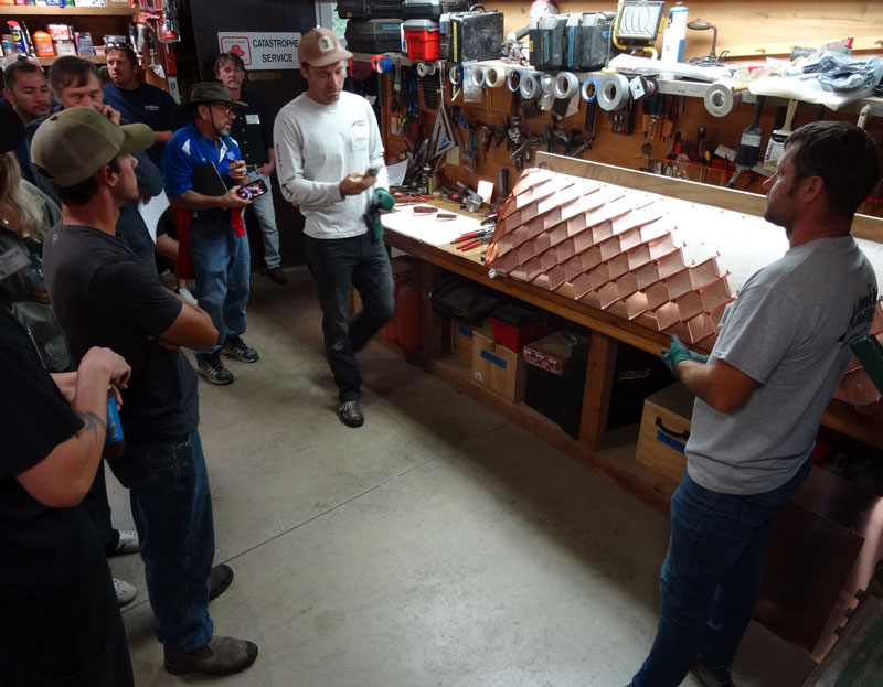 Using copper roof diamonds is taught at the Slate Roofing Contractors Association conference.